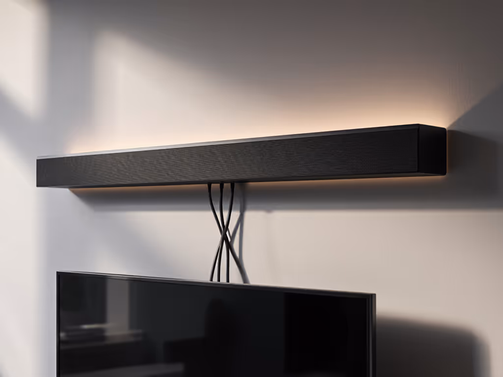 compact_soundbar_wall-mounted_above_tv_with_cable_management